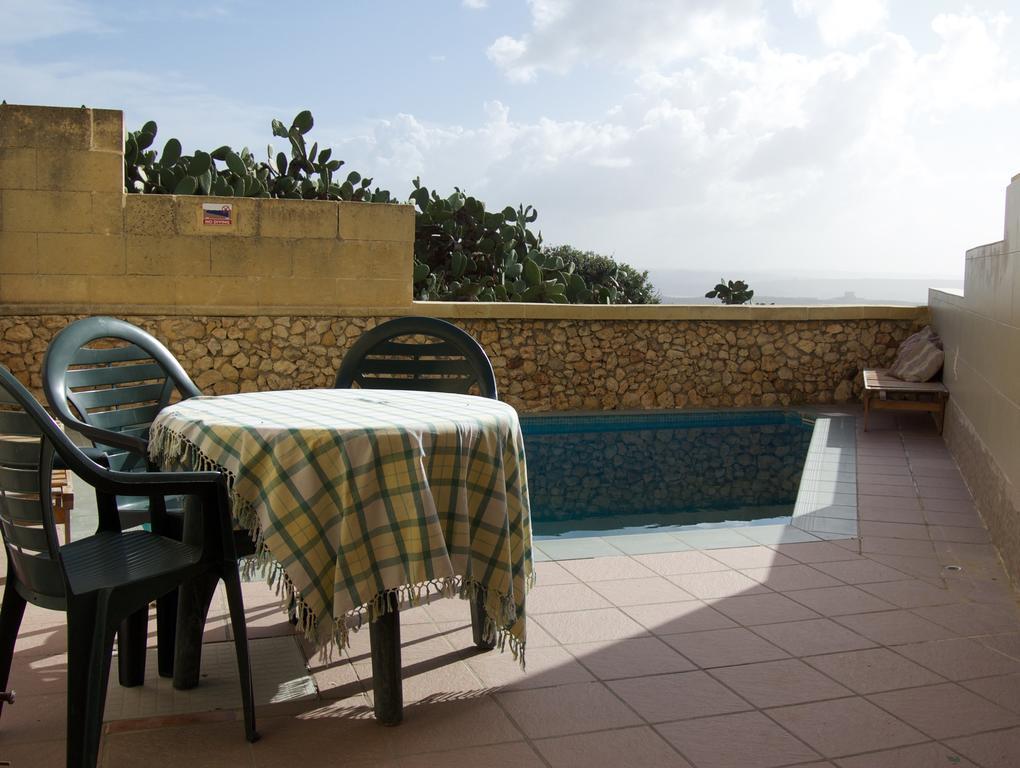 Ta'Kemmuna Hotel Qala Buitenkant foto